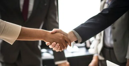 executives shaking hands